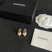 CHANEL 26S DOUBLE C HEART DROP EARRINGS WITH WHITE ENAMEL FLORAL DETAIL IN GOLD METAL 631910