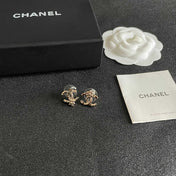 CHANEL 26S DOUBLE C LOGO PEARL STUD EARRINGS WITH FLORAL DETAIL IN GOLD METAL 631917