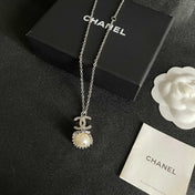CHANEL 26S DOUBLE C LOGO PEARL DROP PENDANT NECKLACE WITH CRYSTAL HALO IN SILVER METAL 633293