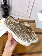 DIOR 26S LOW TOP SNEAKERS IN BROWN OBLIQUE CANVAS WITH RUBBER SOLE