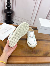 DIOR 26S LOW TOP SNEAKERS IN WHITE CANVAS WITH FLORAL EMBROIDERY