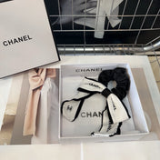 CHANEL 26S BOW SCRUNCHIE IN BLACK AND WHITE SILK 512105