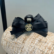 CHANEL 26S BOW HAIR CLIP IN BLACK RIBBON 505313