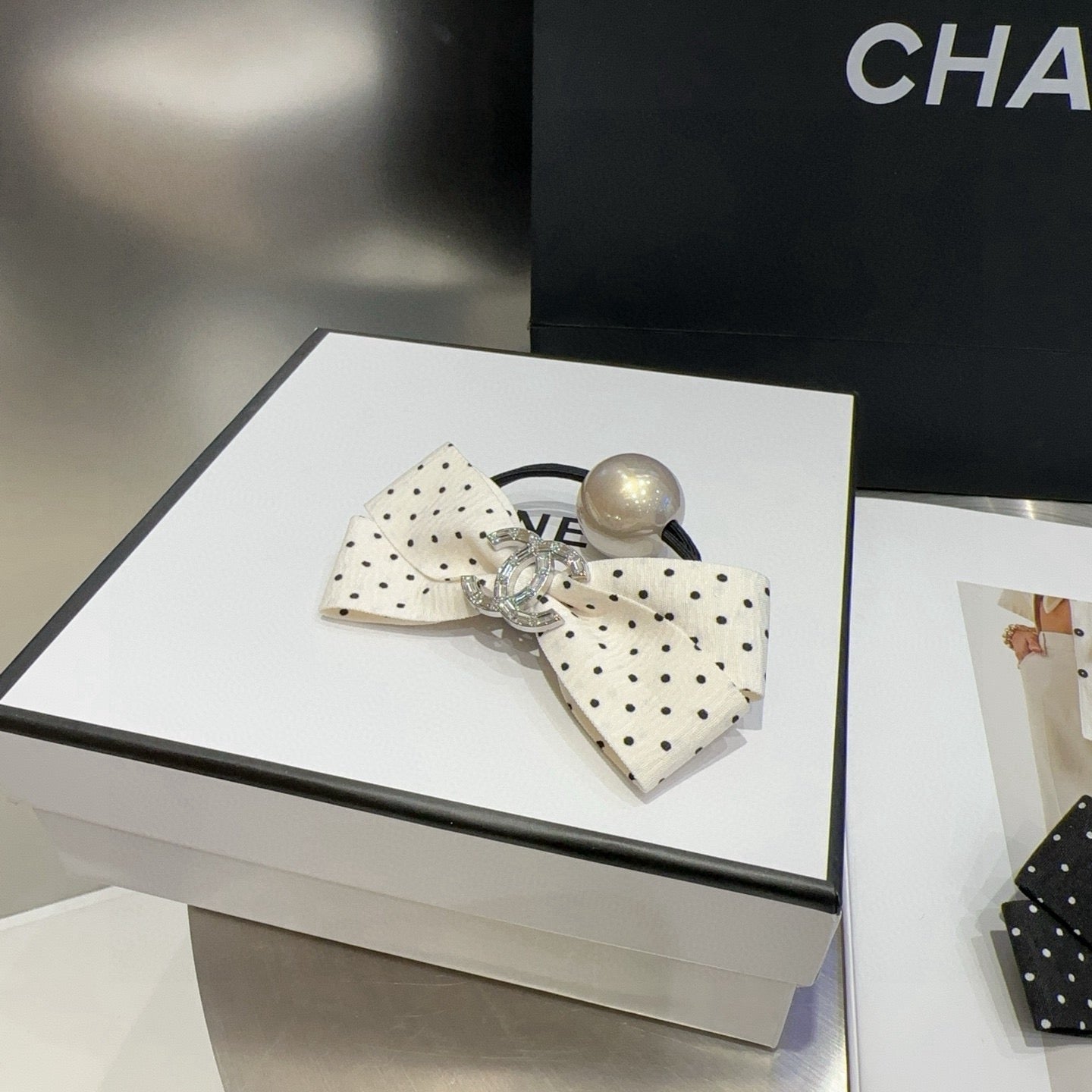 CHANEL 26S BOW HAIR TIE IN BLACK WITH WHITE POLKA DOTS 505301