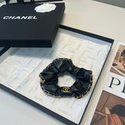 CHANEL 26S SCRUNCHIE IN BLACK LEATHER 512120