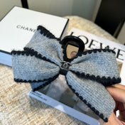 CHANEL 26S BOW HAIR CLIP IN GREY FABRIC 512107