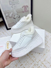 CHLOÉ 26S WEDGE SOLE SNEAKERS IN WHITE CALFSKIN