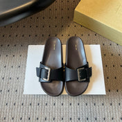 THE ROW 26S BUCKLE SLIDE SANDALS IN BLACK CALFSKIN