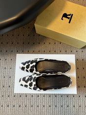THE ROW 26S SQUARE TOE BACKLESS SLIDES IN WHITE COW PRINT CALF HAIR
