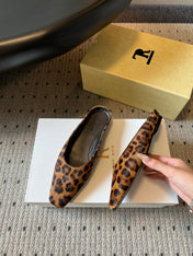 THE ROW 26S SQUARE TOE BACKLESS SLIDES IN BROWN SPOTTED CALF HAIR