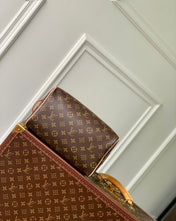 DOPP KIT 28 IN BROWN MONOGRAM CANVAS