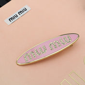 MIUMIU 26S CRYSTAL LOGO HAIR CLIP IN PINK ENAMEL AND GOLD TONE METAL 626894