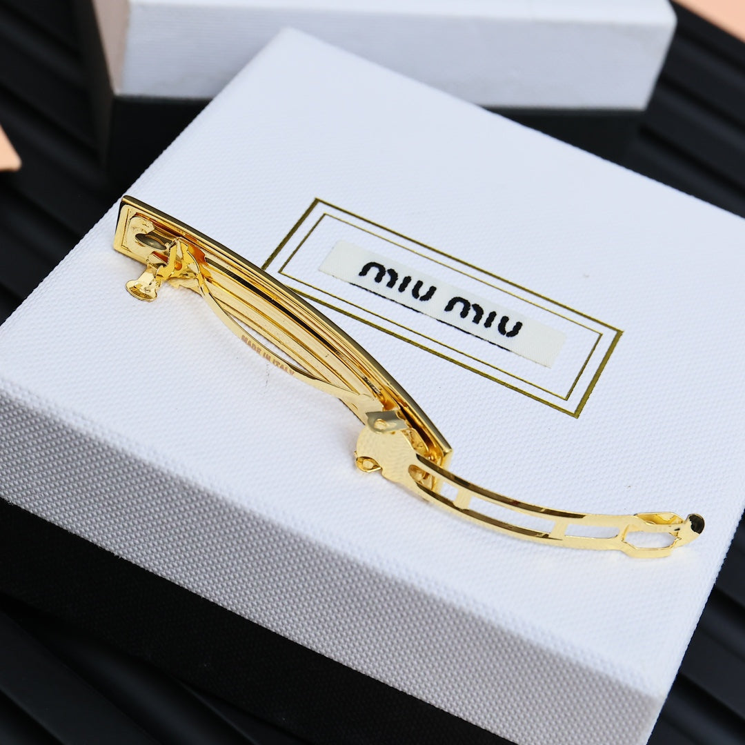 MIUMIU 26S LOGO BAR HAIR CLIP IN PINK ENAMEL AND GOLD TONE METAL 612610