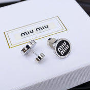 MIUMIU 26S ROUND LOGO STUD EARRINGS IN BLACK ENAMEL AND SILVER TONE METAL 625609