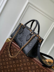 ONTHEGO EAST WEST BAG 25 IN BLACK MONOGRAM EMBOSSED COWHIDE