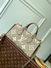ONTHEGO EAST WEST BAG 25 IN GREEN MONOGRAM EMBOSSED COWHIDE