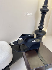 ALAIA WEDGE THONG SANDALS 25S IN BLACK SATIN