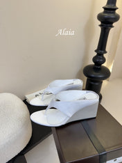 ALAIA WEDGE THONG SANDALS 25S IN WHITE SATIN