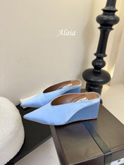 ALAIA HIGH MULES 25S IN LIGHT BLUE SATIN