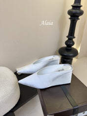 ALAIA HIGH MULES 25S IN WHITE SATIN