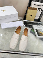 THE ROW 26S PENNY LOAFER FLATS IN IVORY WHITE GRAINED CALFSKIN