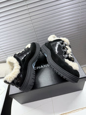CHANEL 25S SNEAKERS WITH FUR ACCENTS 35MM IN BLACK CALFSKIN