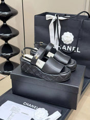 CC HIGH WEDGE SANDALS IN BLACK LAMBSKIN