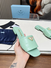 PRA SAFFIANO PATENT SLIDES OSTRICH MOTIF SEAFOAM CALFSKIN