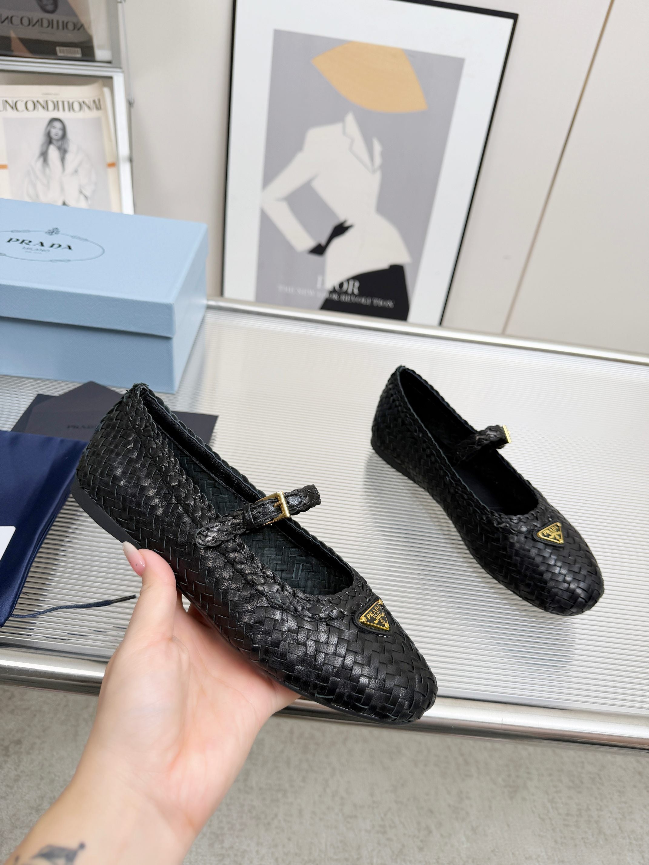 PRADA 26S MARY JANE FLATS IN BLACK WOVEN CALFSKIN