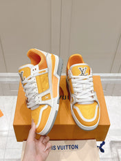 LV TRAINER SNEAKER IN SAFFRAN YELLOW GRAINED CALFSKIN