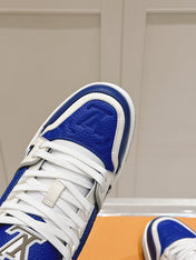 LV TRAINER SNEAKER IN GASTON BLUE GRAINED CALFSKIN