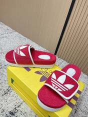 GUCCI 26S PLATFORM SLIDE SANDALS IN RED FABRIC