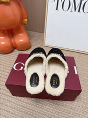 GUCCI 26S SHEARLING-LINED MULES IN BLACK SUEDE