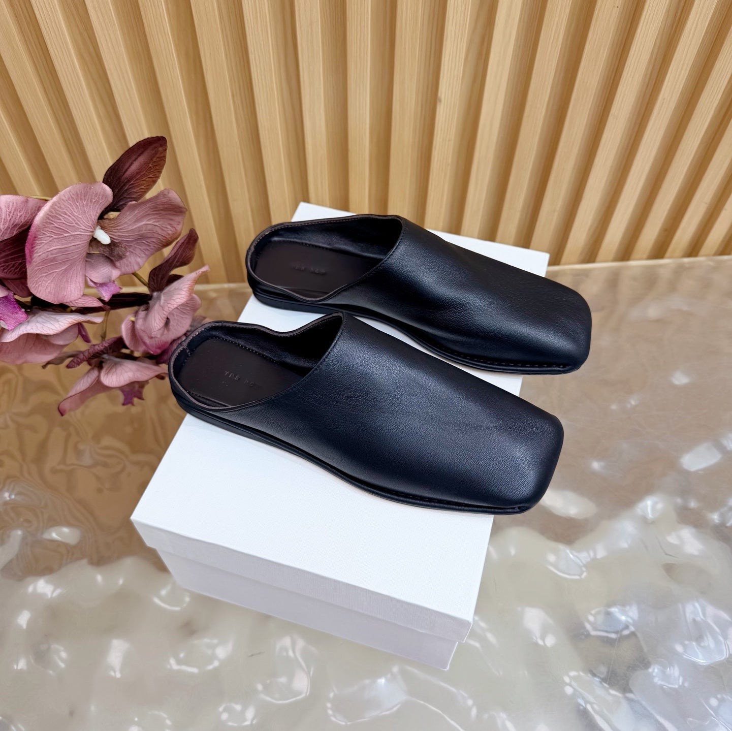 THE ROW 26S SQUARE TOE MULE FLATS IN BLACK CALFSKIN