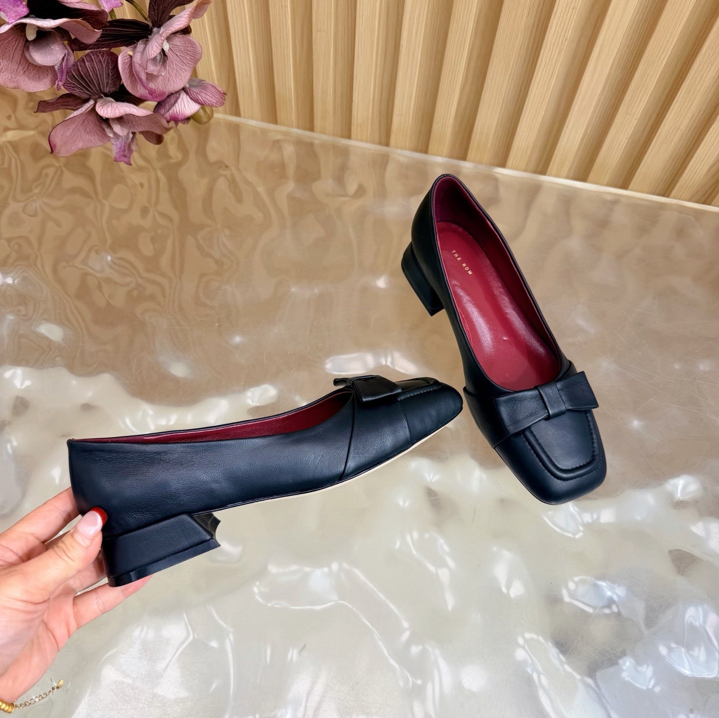 THE ROW 26S SQUARE TOE PUMPS IN BLACK CALFSKIN WITH BOW