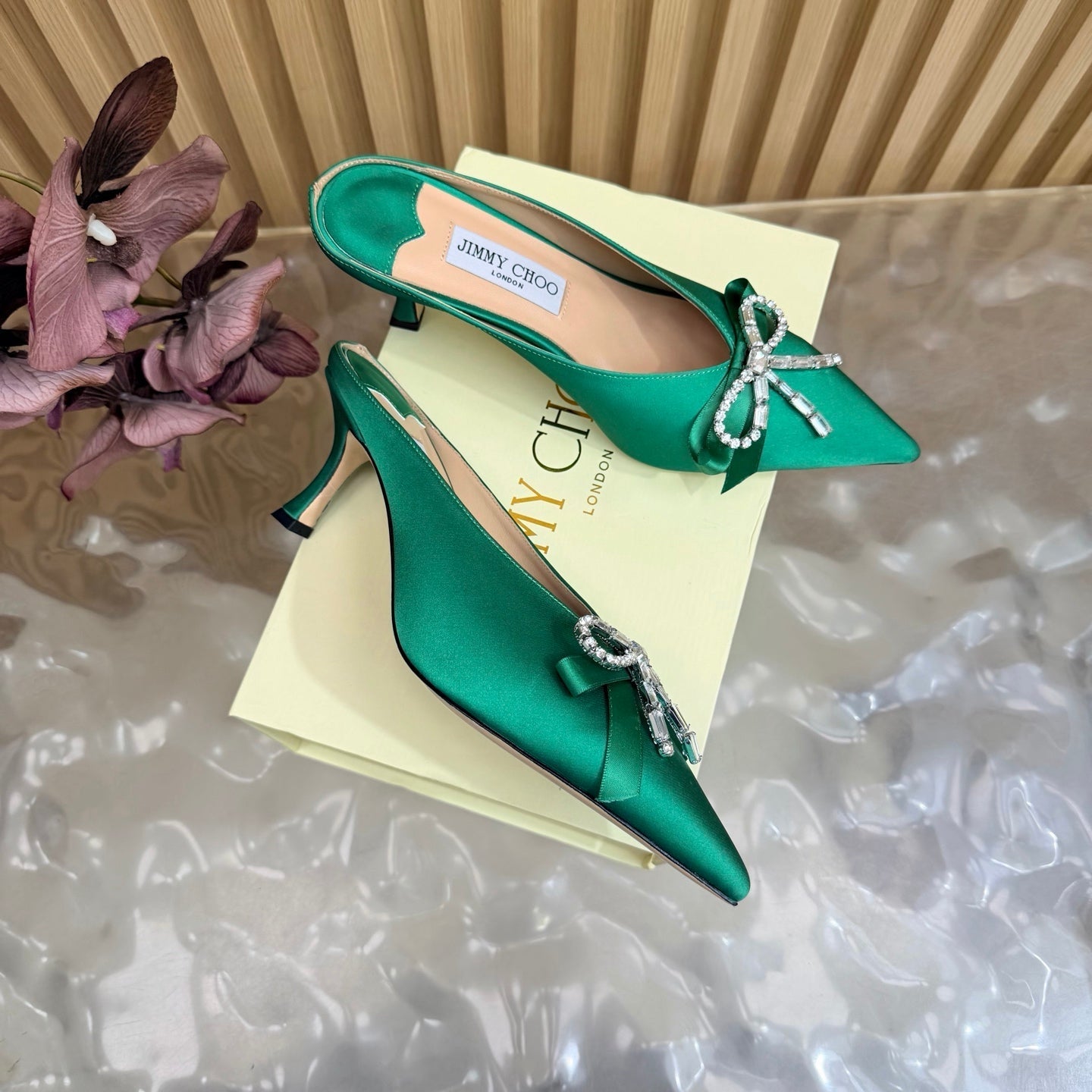 JIMMY CHOO 26S HIGH-HEELED MULES 65 MM IN GREEN SATIN WITH RHINESTONE BOW