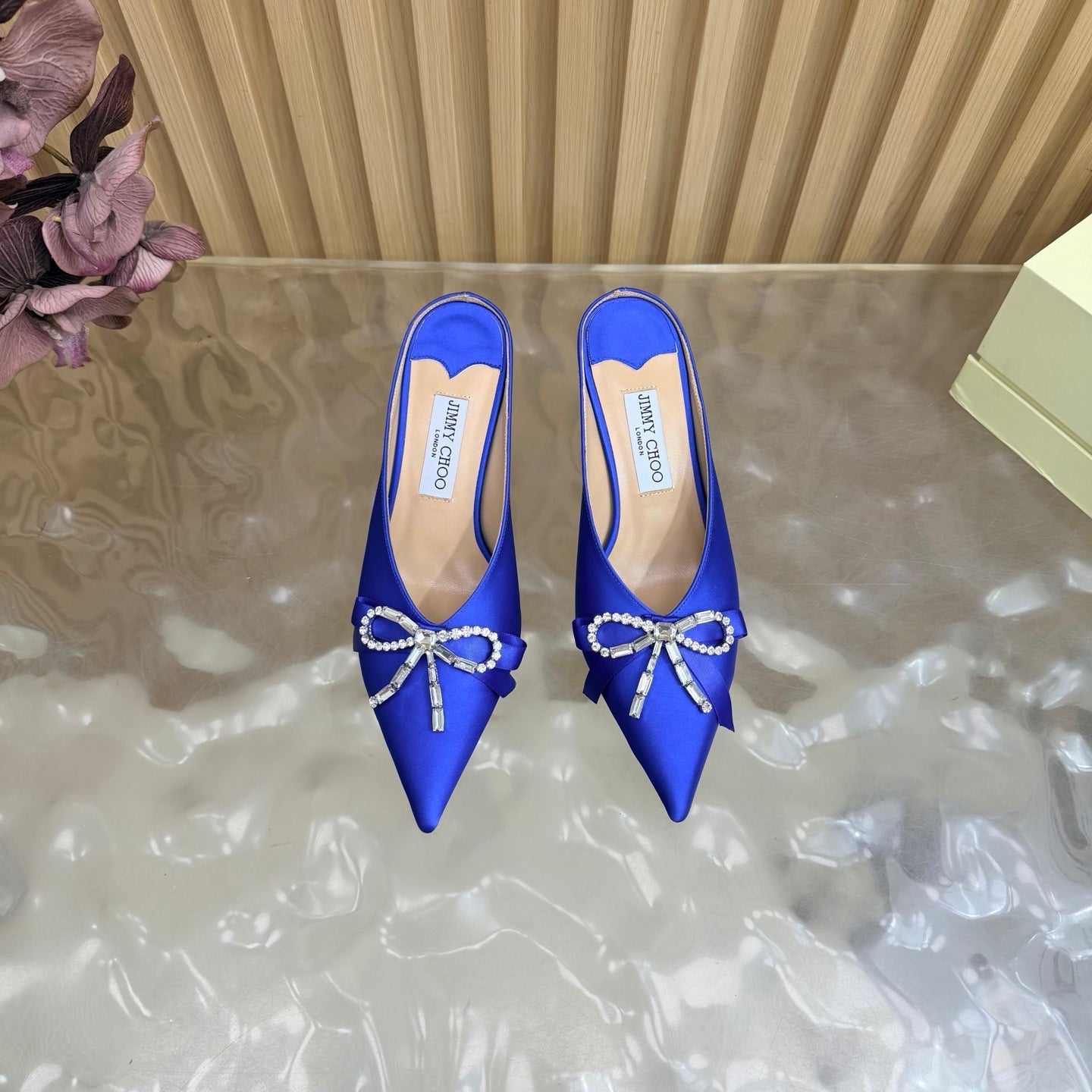 JIMMY CHOO 26S HIGH-HEELED MULES 65 MM IN NAVY BLUE SATIN WITH RHINESTONE BOW