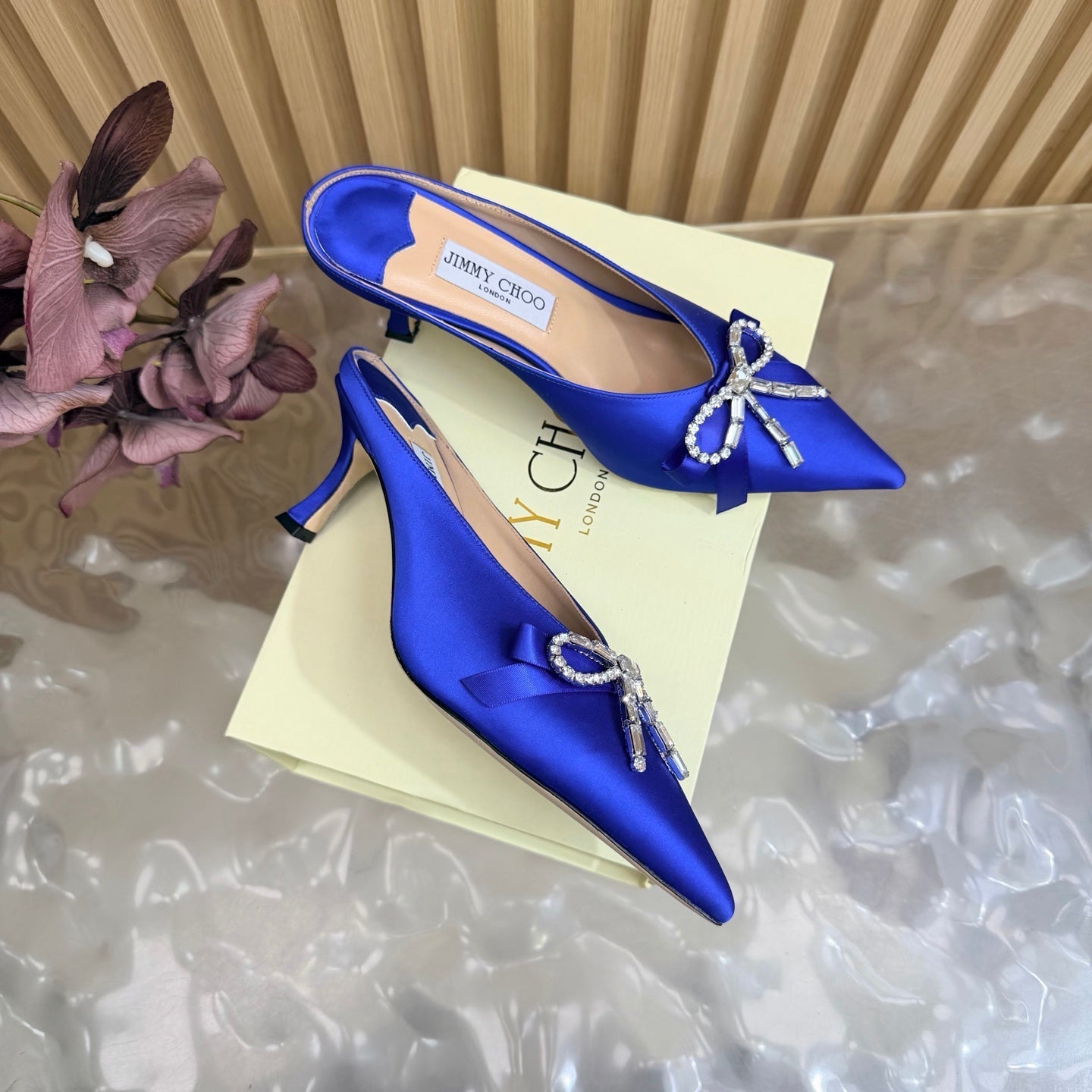 JIMMY CHOO 26S HIGH-HEELED MULES 65 MM IN NAVY BLUE SATIN WITH RHINESTONE BOW