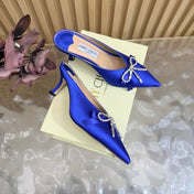 JIMMY CHOO 26S HIGH-HEELED MULES 65 MM IN NAVY BLUE SATIN WITH RHINESTONE BOW