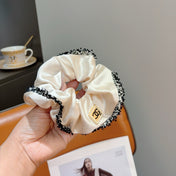CHANEL 26S SCRUNCHIE IN WHITE SILK 512070