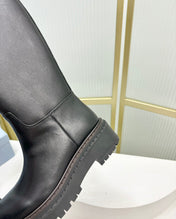 KNEE BOOTS WITH TRIANGLE LOGO IN BLACK CALFSKIN