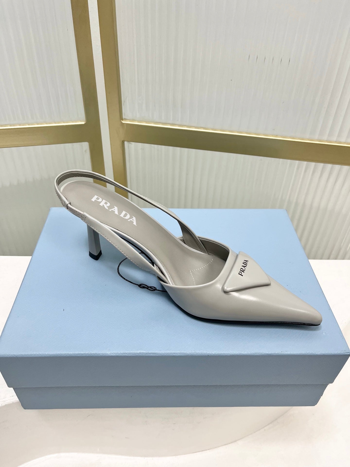 PRADA 26S SLINGBACK HIGH HEEL SANDALS 75MM IN LIGHT GRAY CALFSKIN WITH LOGO