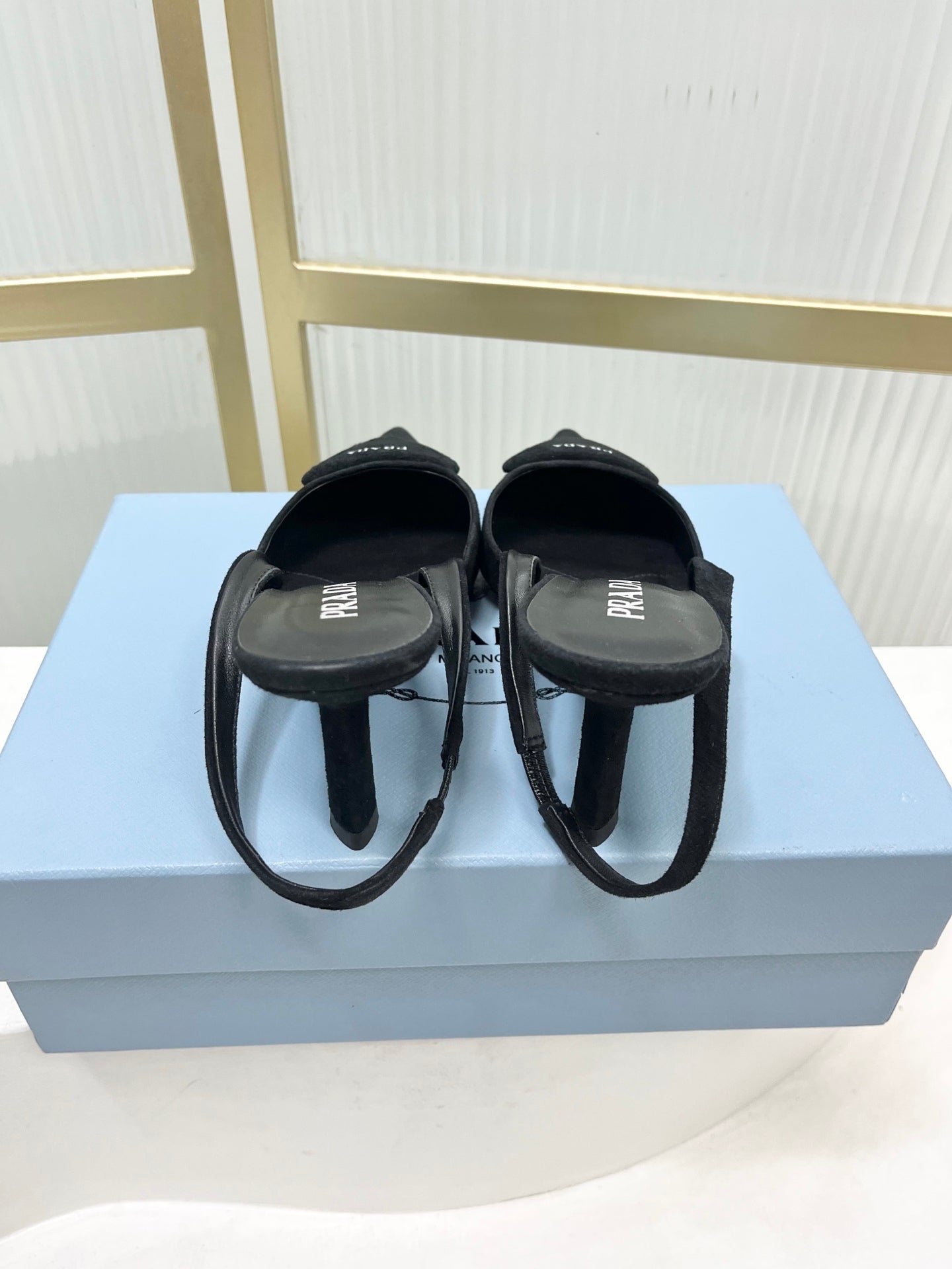 PRADA 26S SLINGBACK HIGH HEEL SANDALS 75MM IN BLACK SUEDE WITH LOGO