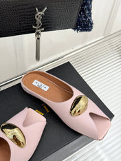 ALAIA FLAT MULE IN LIGHT PINK LAMBSKIN WITH GOLD HARDWARE