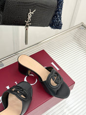 MID-HEEL MULE IN BLACK CALFSKIN