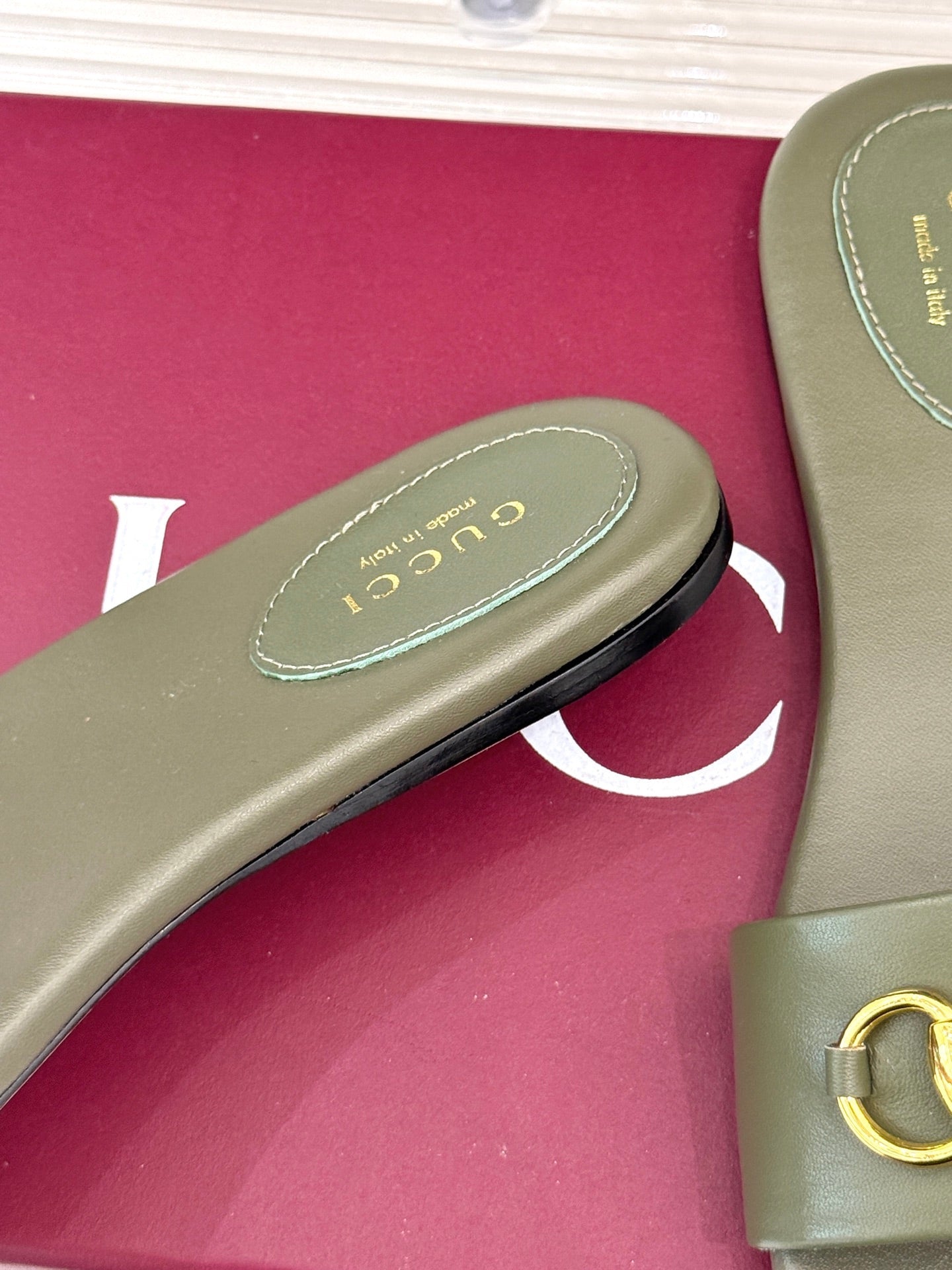 SLIDE SANDALS IN MOSS GREEN CALFSKIN WITH GOLD HARDWARE