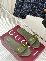 SLIDE SANDALS IN MOSS GREEN CALFSKIN WITH GOLD HARDWARE