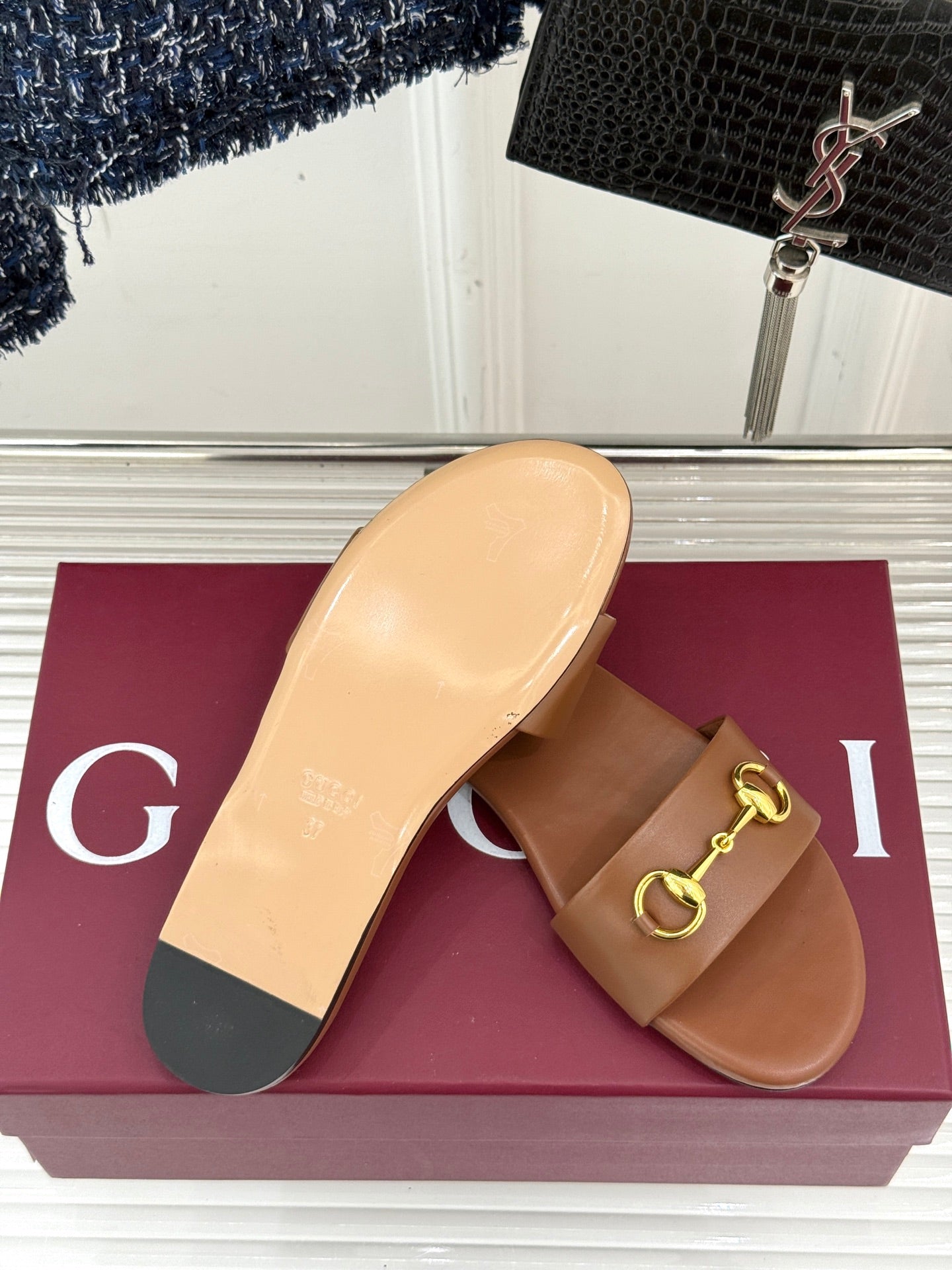 SLIDE SANDALS IN BROWN CALFSKIN WITH GOLD HARDWARE