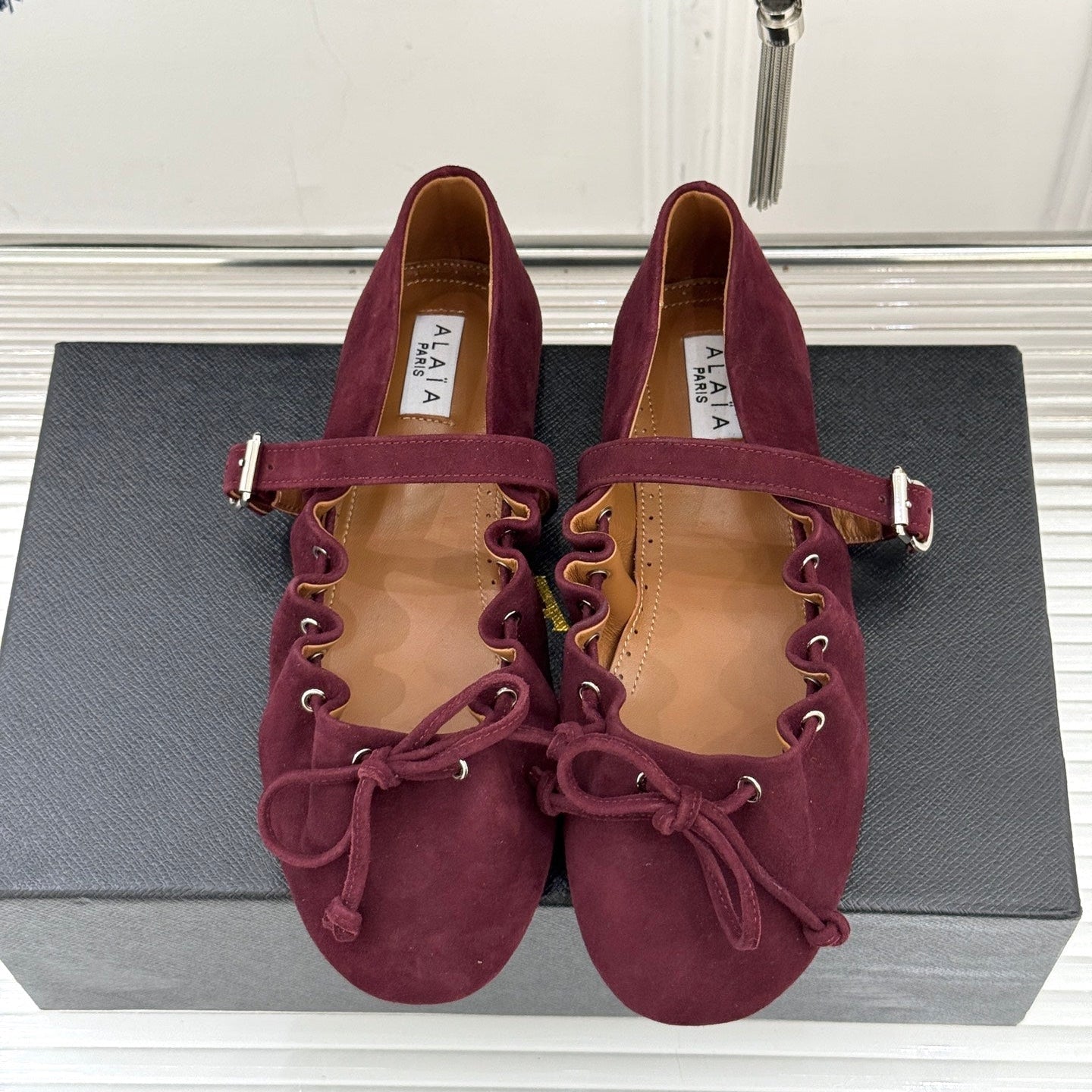 ALAIA 26S MARY JANE FLATS IN DARK RED SUEDE WITH BOW