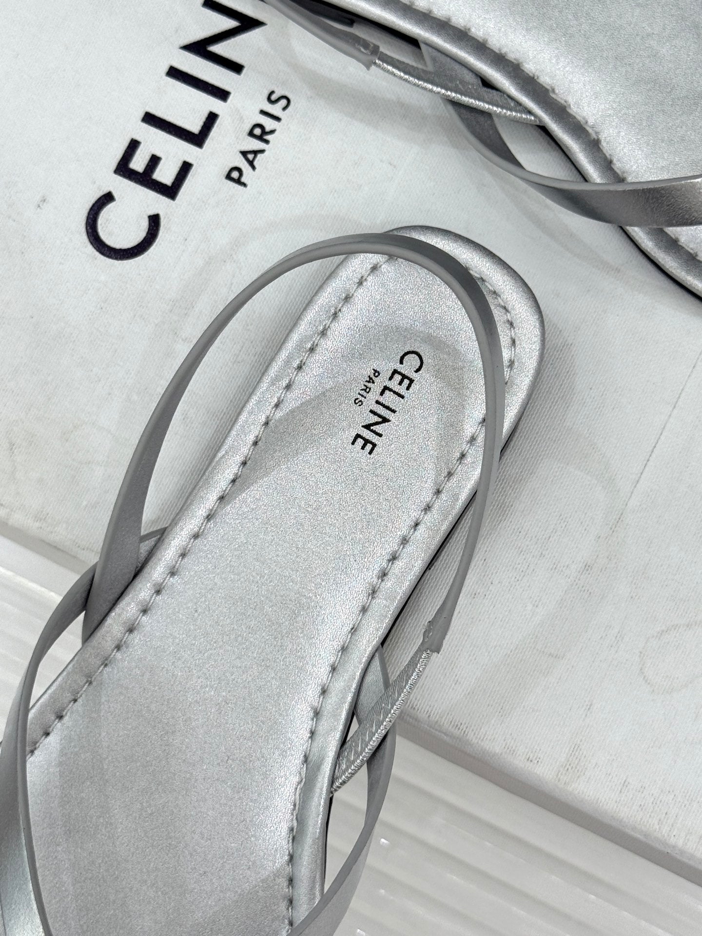 CELINE 26S THONG SANDALS IN SILVER CALFSKIN